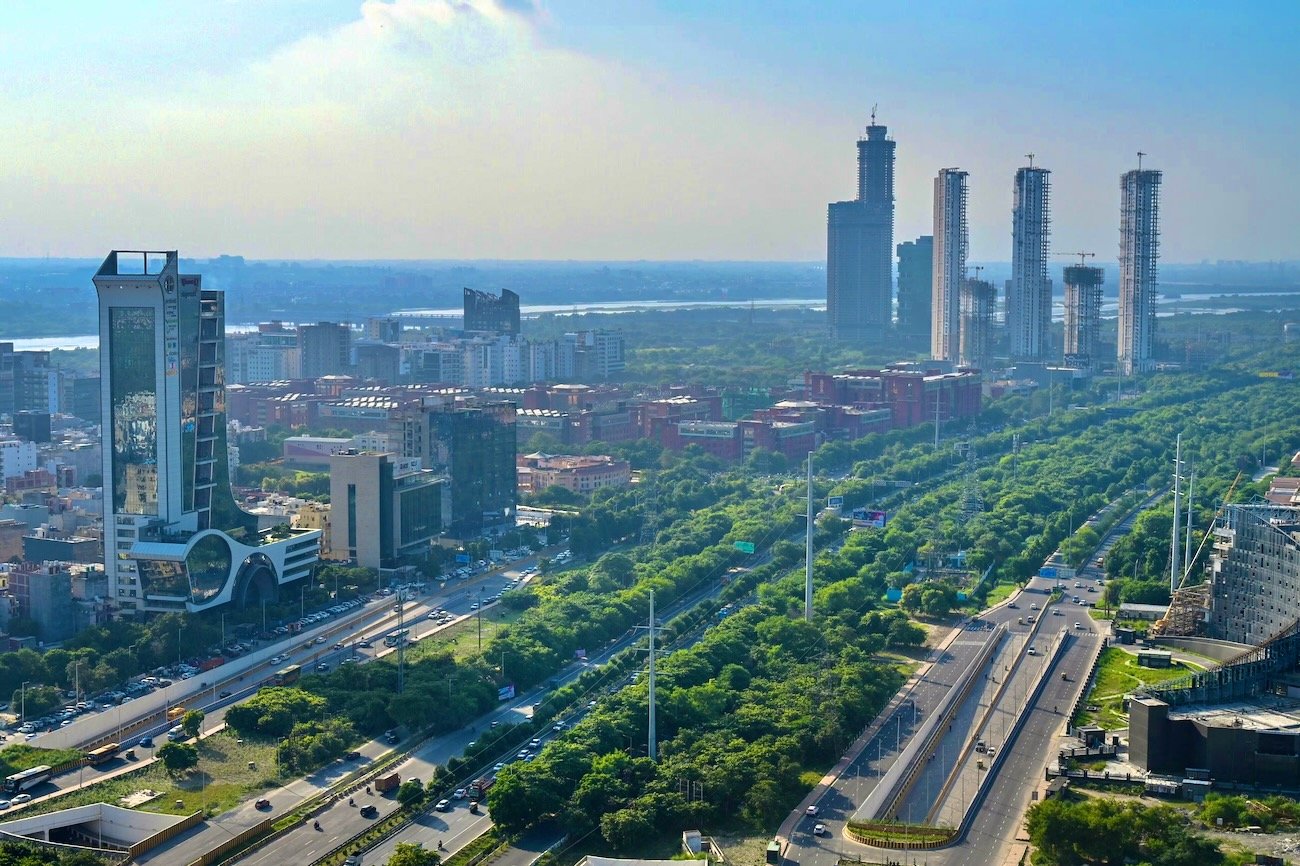 Panoramic view of the modern Noida skyline with skyscrapers and green spaces
